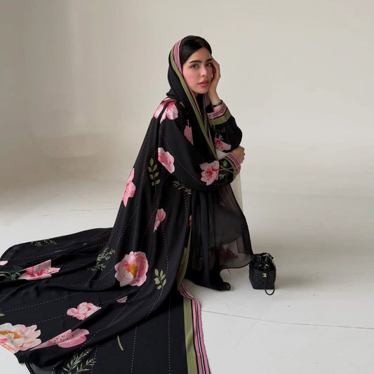 Side view of chiffon ethnic print abaya dress showing flowing silhouette