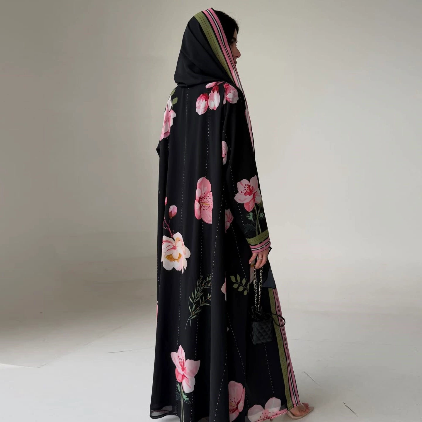 Back view of black chiffon abaya with long sleeves and maxi length
